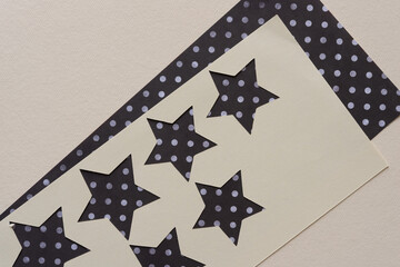 stencil with stars on a backdrop with dots