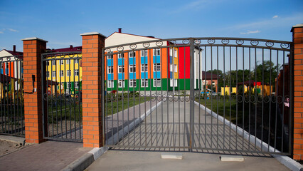 New gates. View of the new kindergarten building block in kazakhstan.