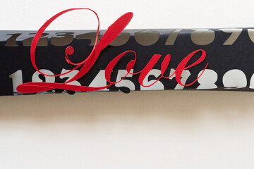 the word love on paper stencil with numbers