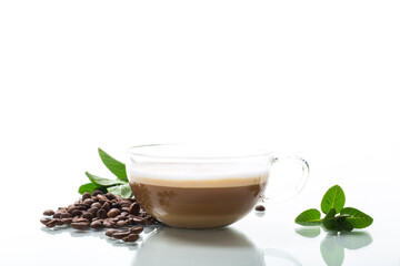 Cup of coffee latte with heart shape and coffee beans