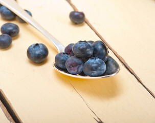 fresh blueberry on silver spoon