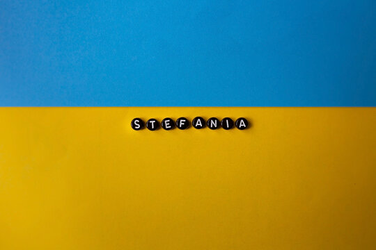Stefania words. Ukraine is the winner. Song Stefania. I love Stefania. song contest. Isolated on the background of the Ukrainian flag