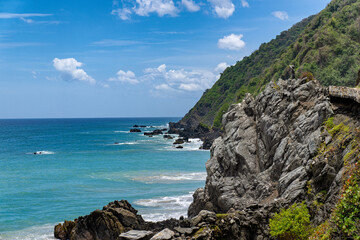 Aerial view Osma coastline, Vargas State, Venezuela. Waves crashing on the shore on a sunny day. © DOUGLAS