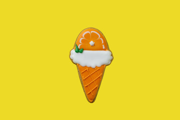 gingerbread in the form of ice cream isolated on yellow background