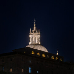 nighttime view of the illuminated cupola and basilica of Saint Ignatius of Loiola