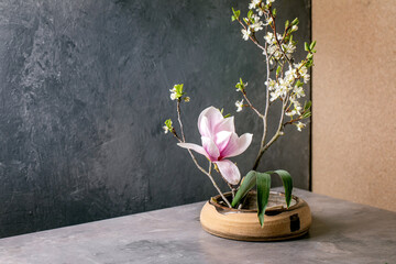 Spring ikebana with white flowers - 504775768