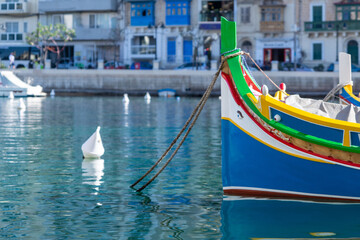 close-up of a traditional fisherman boat moring in a harbor on the island of Malta