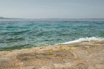 Adriatic Sea and part of the stone beach in Croatia.