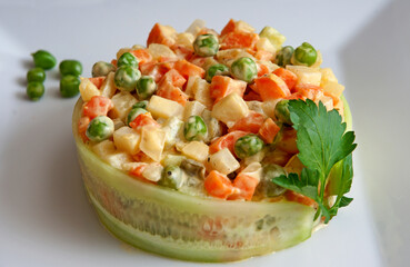 Olivier salad with vegetables and meat.  Selective focus