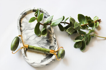 Decorative marble plaster stand and jade massager.