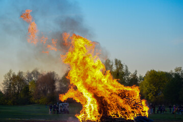 firefighters put out a big fire in the forest. Flame and smoke