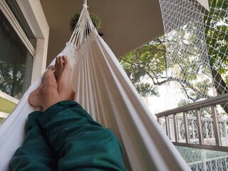 person in hammock © Luciano Luppa