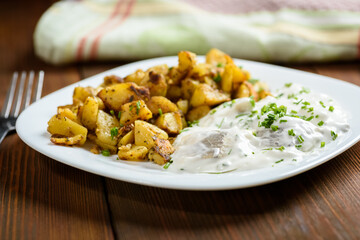 herring in cream and fried potatoes