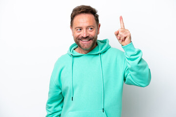 Fototapeta premium Middle age caucasian man isolated on white background intending to realizes the solution while lifting a finger up