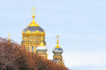 Fototapeta na wymiar Church of the Assumption of the Blessed Virgin in St. Petersburg, Russia. Golden domes