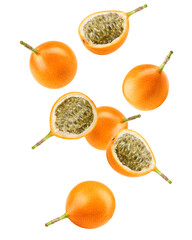 Falling Granadilla or yellow passion fruit isolated on white background, clipping path, full depth of field