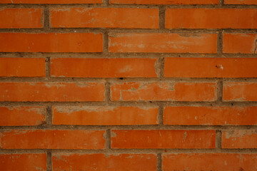 closeup. fragment of an orange brick wall. High quality photo