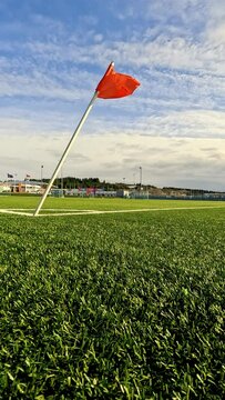 red flag on a green sports field