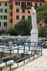 Statue of Santa Margherita facing sea at Tigullio Gulf of Santa Margherita Ligure, praying for safe...