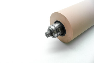 Anilox roller for flexographic printing machine. Raster cylinder for transferring ink to the printing roller. Selective focus, isolated on white