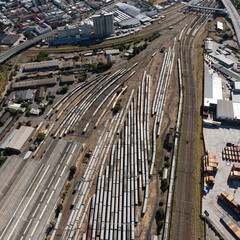 Cape Town, South Africa. 2022. Aerial view of trains and the railway tracks  in the south east district of Cape Town.