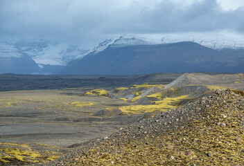 Iceland autumn tundra landscape near Haoldukvisl glacier, Iceland. Glacier tongue slides from the Vatnajokull icecap or Vatna Glacier near subglacial Esjufjoll volcano. Not far from Iceland Ring Road.