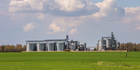 agro silos granary elevator on agro-processing manufacturing plant for processing drying cleaning and storage of agricultural products, flour, cereals and grain.