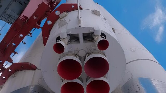 Space rocket on the launch complex, four powerful jet engines with multiple nozzles. Shot in motion
