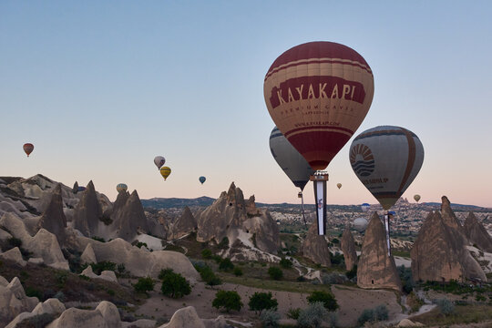 CAPPADOCIA, TURKEY - MAY 18, 2021: Hot-air ballons flying above Cappadocia