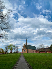 Old Poland cathedral building in the city park