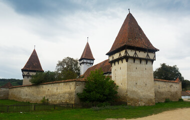 Obraz premium Church Fortification in Cincsor is landmark of Transilvania in Romania.
