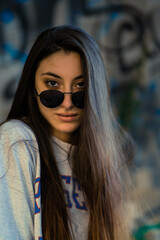 portrait of beautiful young white girl with sunglasses