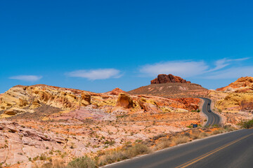 Winding road in red colorful desert mountain in southwest USA