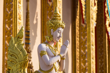 Bangkok, Thailand - April, 22, 2022 : Angel statue in temple at Bangkok, Thailand.