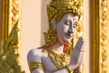 Bangkok, Thailand - April, 22, 2022 : Angel statue in temple at Bangkok, Thailand.