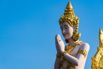 Obraz premium Bangkok, Thailand - April, 22, 2022 : Angel statue in temple at Bangkok, Thailand.