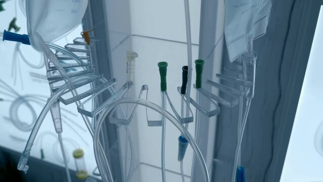 An intravenous drip in the clinic is a quick way to deliver the components that the patient's body needs to the cells of the body. Medical equipment - instruments for medical procedures