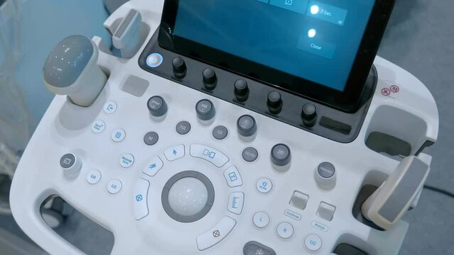 New modern ultrasound machine for medical examinations of patients. Close up. Shot in motion
