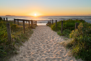 Sunrise over beach path