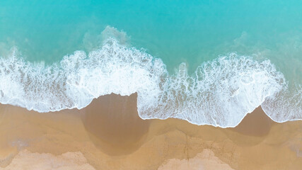 Top view of the Ocean seashore with beautiful color sea waves. Wonderful seascape with copy space background