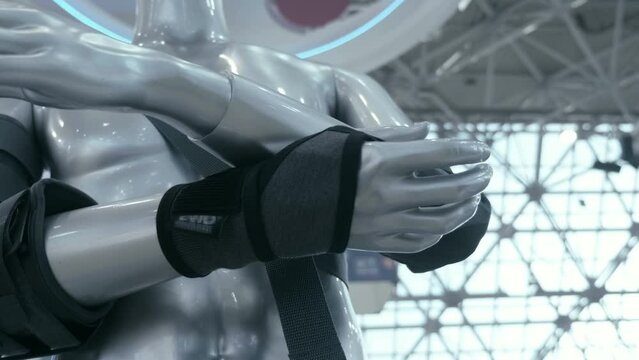 On the mannequin, an elastic bandage on the wrist for the treatment of injury or with heavy loads on the arm. Closeup. Shot in motion