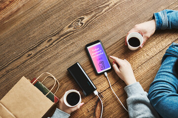 Online shopping. Paying for ticket online. Ordering product in online shop using smartphone....