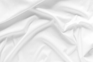 Fototapeta premium White fabric. luxurious white fabric texture background. Creases of satin, silk, and cotton.