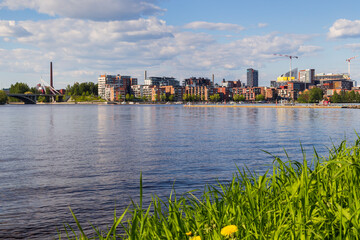 Naklejka premium View of Tampere city over the lake Pyhäjärvi in Finland in the summer.