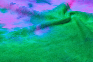 Abstract tie dye neon multicolor folded fabric cloth boho pattern texture for background, sale...