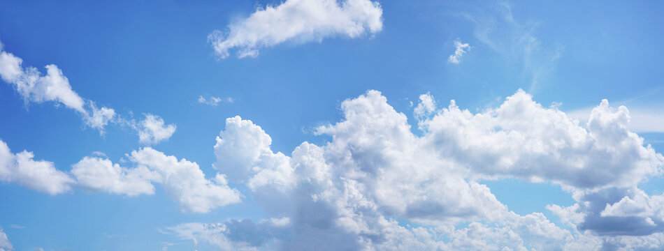 White cloud with blue sky background.