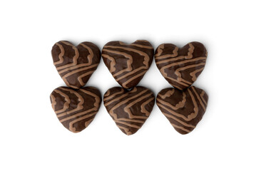 Gingerbread hearts covered chocolate glaze and with jam filling isolated on white background.
