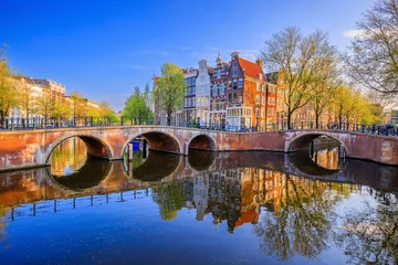 Fototapeten Amsterdam, Netherlands. The Keizersgracht (Emperor's) canal and bridges in the morning. © SCStock