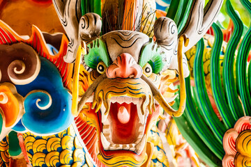 Nakhon Sawan, Thailand - March, 23, 2022 : Dragon head sculpture at Shrine Serpent king Chan Sen Is a Chinese style temple Created for people to worship gods. - obrazy, fototapety, plakaty