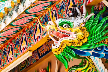 Nakhon Sawan, Thailand - March, 23, 2022 : Dragon head sculpture at Shrine Serpent king Chan Sen Is a Chinese style temple Created for people to worship gods.